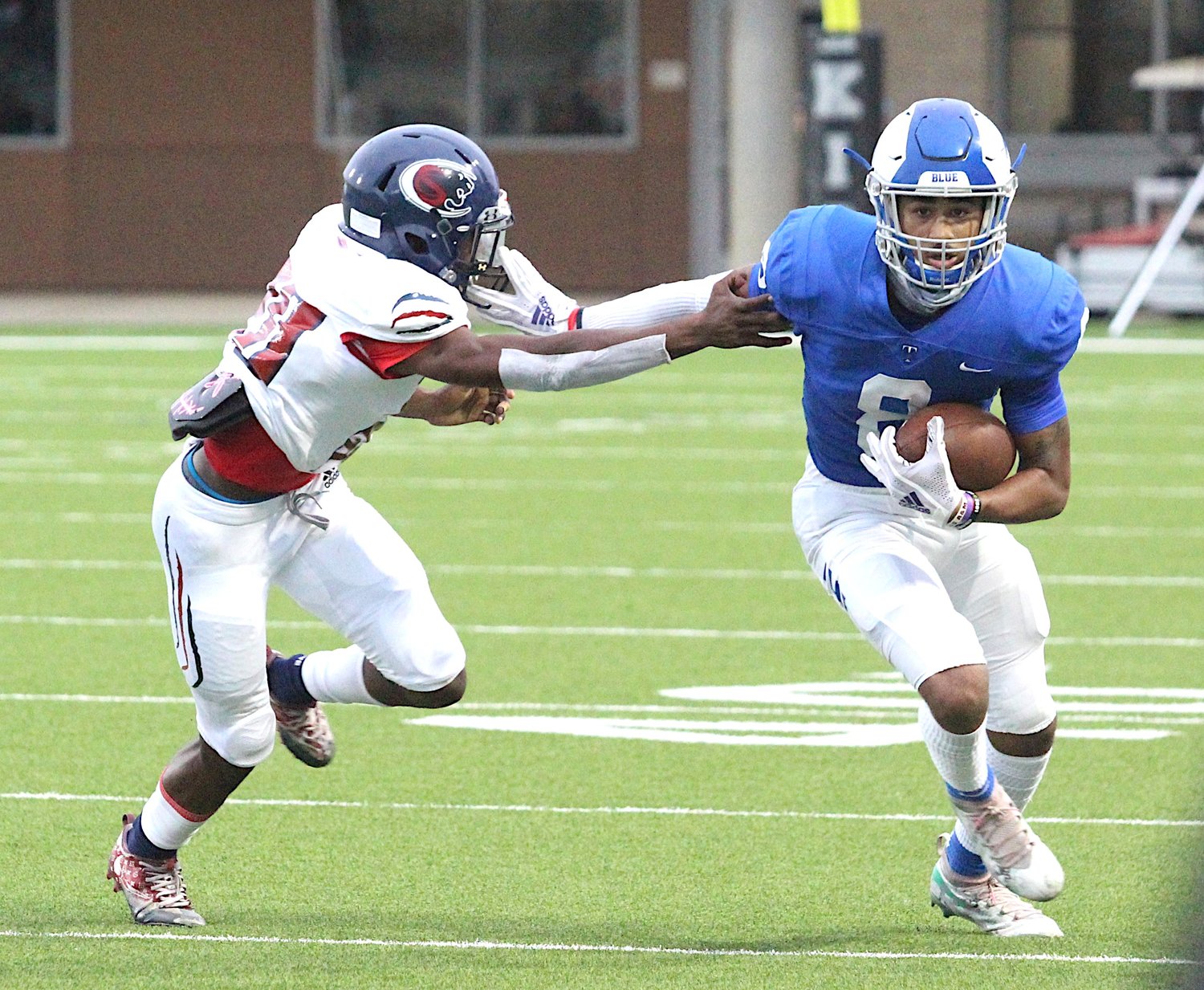 Taylor senior receiver Tyrone Irving III makes a catch-and-run during the Mustangs' win over Cy-Springs on Sept. 24 at Legacy Stadium.